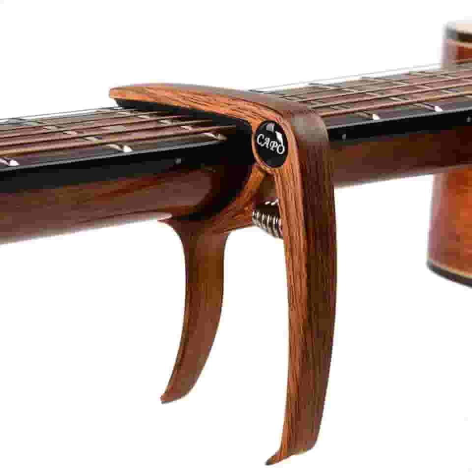 Capotraste Abraçadeira Violão Guitarra Ukulele Profissional Aço e Nylon - Amadeirado Magno